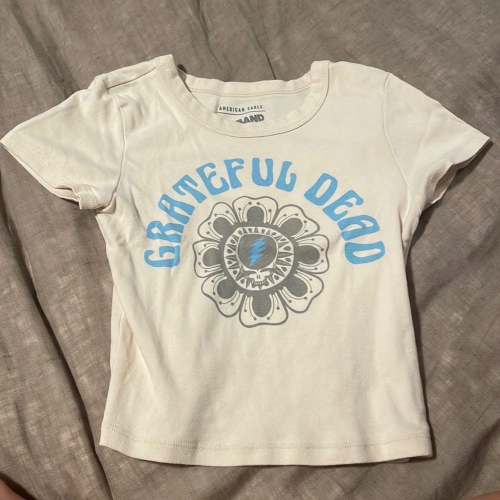 American eagle cream colored graphic baby tee size S